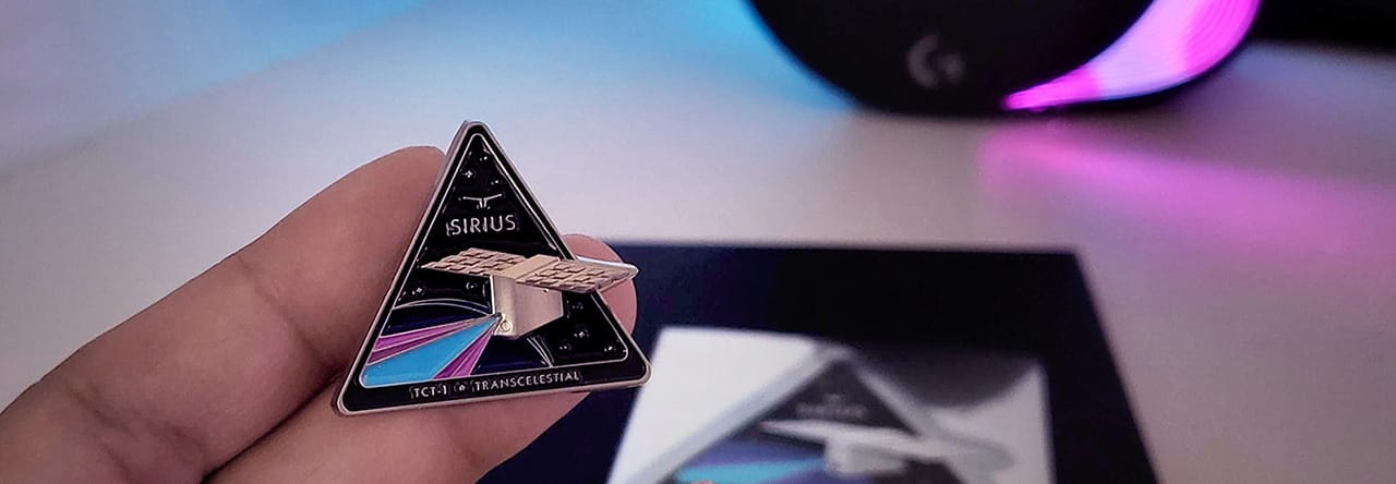 Hand holding metal pin